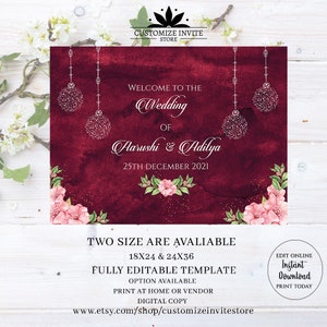 May include: A burgundy wedding invitation template with a floral design and silver glitter ornaments. The text reads "Welcome to the Wedding of Aarushi & Adilya 25th December 2021". The template is fully editable and available in two sizes: 18x24 and 24x36 inches.