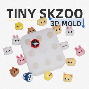 May include: A white silicone mold with multiple cavities, surrounded by small, colorful animal-shaped resin pieces. The mold has a red and black emblem in the center. The text "TINY SKZOO 3D MOLD" is displayed at the top.