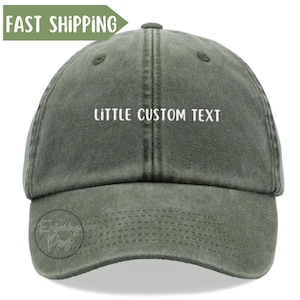 May include: A dark green, washed cotton baseball cap with white embroidered text that reads "LITTLE CUSTOM TEXT".