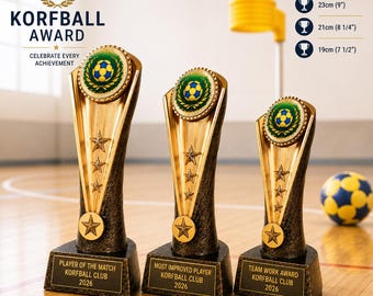 May include: Three gold and black trophies with a circular emblem featuring a blue and yellow ball. Each trophy has three stars and a base with text: Player of the Match, Most Improved Player, and Team Work Award. Sizes are 9, 8 1/4, and 7 1/2 inches.