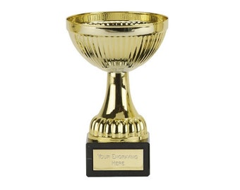 May include: A gold-colored trophy cup with a black base. The base has a small plaque with the text "Your Engraving Here".