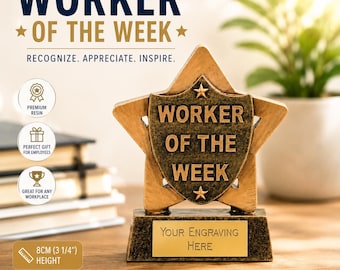 May include: A star-shaped trophy with a bronze finish featuring a central shield with the text WORKER OF THE WEEK and two small stars. The base includes a gold plaque with the text YOUR ENGRAVING HERE. The trophy stands 3 1/4 inches tall.
