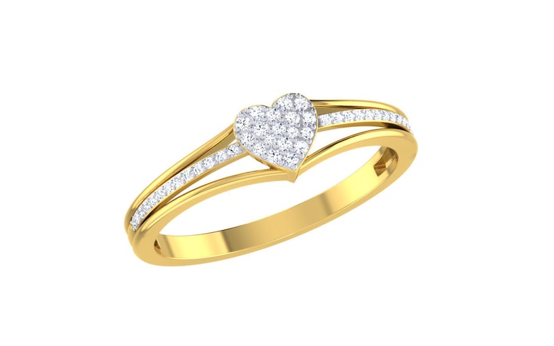 May include: A gold ring with a heart-shaped diamond center and two bands of smaller diamonds.