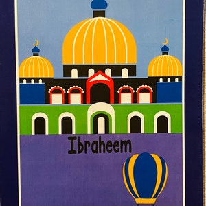 May include: A blue and purple prayer rug with a colorful illustration of a mosque with a golden dome and a hot air balloon. The rug has the name "Ibraheem" written on it.