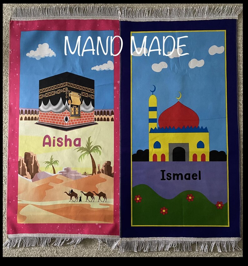 May include: Two handmade prayer rugs with colorful designs. The left rug features a pink background with a depiction of the Kaaba, a desert landscape, and the name Aisha. The right rug has a blue background with a mosque, green grass, and the name Ismael.