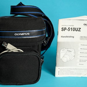 Olympus SP-510UZ Digicam with 7.1 Megapixels CCD sensor, 10x ultrazoom lens and xD memory card included / Vintage Bridge Digicam SP 510 uz image 9