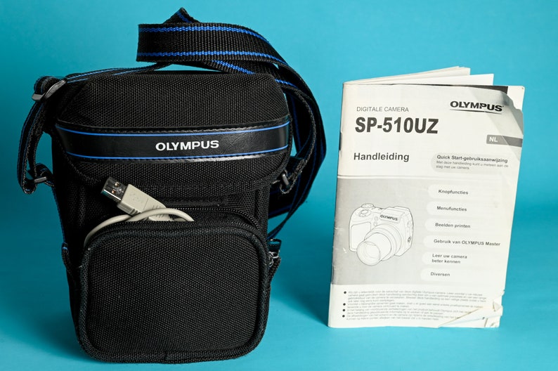 Olympus SP-510UZ Digicam with 7.1 Megapixels CCD sensor, 10x ultrazoom lens and xD memory card included / Vintage Bridge Digicam SP 510 uz image 9