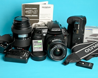 Olympus E-3 Flagship with Zuiko 14-45mm & 40-150mm lenses and Battery Grip / 10 Megapixels / E3 Professional Weather Sealed Digital Camera