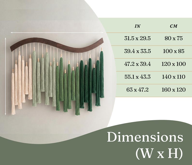 May include: A wall hanging featuring a dark brown curved wooden bar with hanging yarn tassels in an ombre gradient from cream to sage and dark forest green, accented with small wooden beads. A chart lists dimensions from 31.5 x 29.5 to 63 x 47.2 inches.