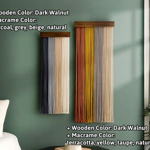 May include: Two macrame wall hangings with dark walnut wooden tops. One features charcoal, grey, beige, and natural macrame colors. The other displays terracotta, yellow, taupe, and natural macrame colors. The text on the image reads: + Wooden Color: Dark Walnut + Macrame Color: charcoal, grey, beige, natural and terracotta, yellow, taupe, natural.