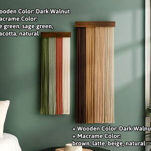 May include: Two macrame wall hangings with dark walnut wooden tops. The smaller one features olive green, sage green, terracotta, and natural macrame. The larger one displays brown, latte, beige, and natural macrame. The text on the image indicates the wooden color and macrame colors.