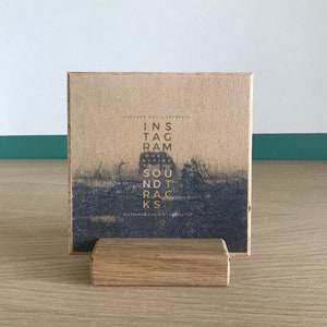 Wooden CD with unique download code.
