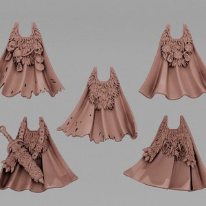 May include: Six different brown plastic miniature capes with fur trim and various details. The capes are for use with miniature figures.