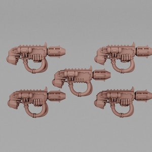 May include: Five identical light brown miniature sci-fi plasma weapons arranged in a pentagonal formation. Each weapon features a bulky rectangular body, a circular handle underneath, a serrated top edge, and a conical nozzle at the front end.