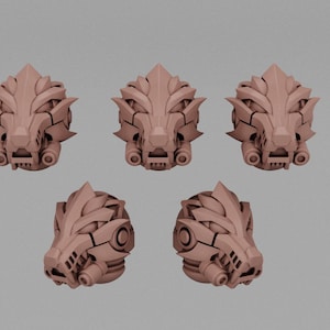 May include: Five tan-colored, stylized lion head sculptures. The heads have a mechanical, futuristic design with sharp angles and circular details. The sculptures are arranged in a group, showcasing different angles.