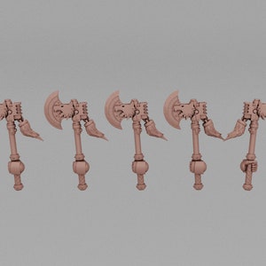 May include: Five light brown miniature axes. Each axe features a curved blade with a wolf head design, a detailed handle, and a decorative element. The axes are arranged in a row against a neutral background, showcasing their design.