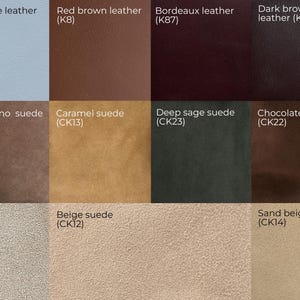 May include: A selection of leather and suede swatches in a range of colours. The palette includes milky, light blue, red-brown, dark brown, and black leather. Suede options are cold grey, cappuccino, caramel, deep sage, chocolate, and sand beige.