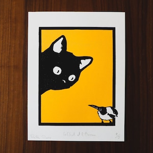 El gato y el pájaro (amarillo)