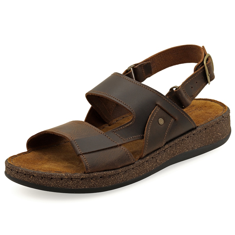 May include: Brown leather sandals with a buckle closure and a cork platform sole.