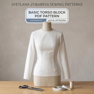 May include: A white long-sleeve top on a dress form with text reading SVETLANA ZUBAREVA SEWING PATTERNS, BASIC TORSO BLOCK PDF PATTERN, CUSTOM FIT, A4/US LETTER/A0. Includes sewing scissors, a coiled measuring tape, and a wooden thread spool.