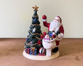 Royal Doulton Santa’s Finishing Touch M268 Figurine
