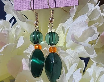 Green glass, beaded, dangle earrings.