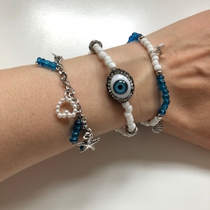 Blue eyes perfect for holidays ~ Personalised adding initial letter. Beaded bracelet. Evil eye bracelet. Good luck bracelet.