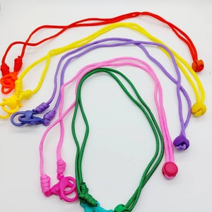 Mobile phone chain with adjustable cord for hanging around your neck. Mobile phone strap in yellow, pink, orange-red, green, purple.