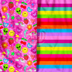 May include: A pink fabric with a glittery pattern of smiley faces, cherries, stars, rainbows, and alien heads. The fabric is paired with a striped fabric with alternating colors of pink, purple, blue, green, yellow, orange, and red.