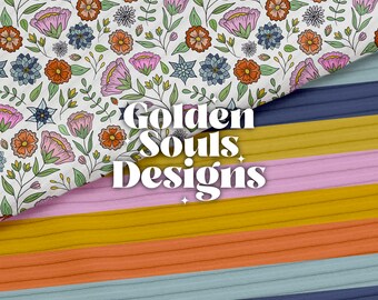 Könnte beinhalten: Ein weißer Hintergrund mit einem floralen Muster in den Farben Rosa, Orange, Blau und Grün. Das Muster ist mit einem gestreiften Stoff in den Farben Gelb, Orange, Rosa, Blau und Grau überlagert. Der Text "Golden Souls Designs" ist mittig auf dem Bild platziert.
