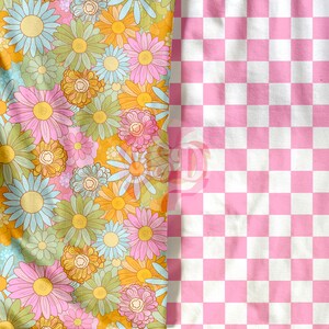 May include: A fabric with a floral pattern of pink, blue, and yellow daisies on a yellow background. The fabric is next to a pink and white checkered fabric.