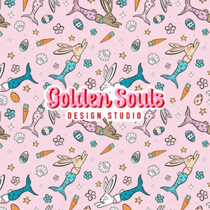 May include: A seamless pattern featuring a pink background with a variety of pastel-colored illustrations. The pattern includes mermaids, carrots, seashells, stars, flowers, and eggs. The text "Golden Souls Design Studio" is featured in the center of the pattern.