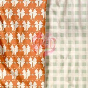 May include: Two fabric swatches, one with a white bow pattern on an orange background and the other with a green and white gingham pattern.