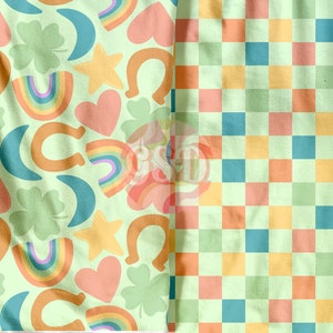 May include: A green fabric with a repeating pattern of rainbows, hearts, stars, horseshoes, and four-leaf clovers. The fabric is next to a green fabric with a checkered pattern of orange, pink, blue, and green squares.