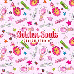 May include: A pink and white seamless pattern featuring various beauty products, including lip gloss, perfume bottles, and rollerball essential oil bottles. The pattern also includes stars, flowers, and the text "Golden Souls Design Studio".