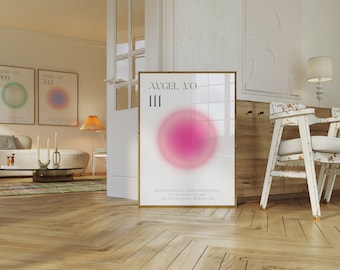 May include: A white framed poster with a pink and white gradient circle and the text "ANGEL NO. 111" and the text "YOUR INTENTIONS AND DREAMS ARE MANIFESTING. FOCUS ON WHAT YOU WANT, AND THE UNIVERSE WILL BE BEHIND YOU."