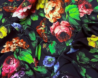 Luxury Italian fabric by the yard with bright floral print on dark background, fashion sewing fabric with flowers for dress, skirt, blouse