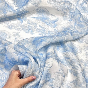 Natural linen fabric by the yard with toile de jouy print Cruise collection, animal print Italian blue apparel clothing fabric