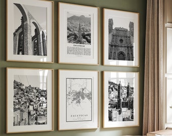 May include: A set of six black and white framed prints depicting various views of Zacatecas, Mexico. The prints are arranged in a grid pattern on a green wall. The prints include an aerial view of the city, a map of the city, and a close-up of a building.