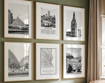 May include: A living room with a green wall and a light brown couch. There are six black and white framed photos on the wall, each depicting a different landmark in Milwaukee, Wisconsin. The photos include the Milwaukee Art Museum, the City Hall, the Milwaukee Brewers stadium, and a map of the city.