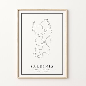 May include: A black and white line art map of Sardinia, an island in the Mediterranean Sea. The map includes the island's name, "Sardinia", and the coordinates "40.1209&deg; N, 9.0129&deg; E".