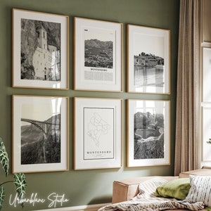 May include: A set of six black and white framed prints depicting various landscapes and landmarks of Montenegro. The prints include a mountain range, a bridge, a town, a map, and a church.