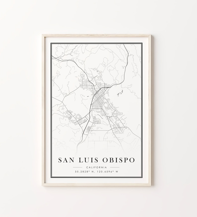 May include: Black and white line art map of San Luis Obispo, California. The map shows the city streets and surrounding area. The text "San Luis Obispo, California 35.2828&deg; N, 120.6596&deg; W" is printed below the map.