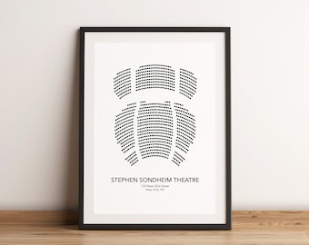 May include: A black and white print of the seating chart for the Stephen Sondheim Theatre in New York City. The print is framed in a black frame and is hanging on a white wall.