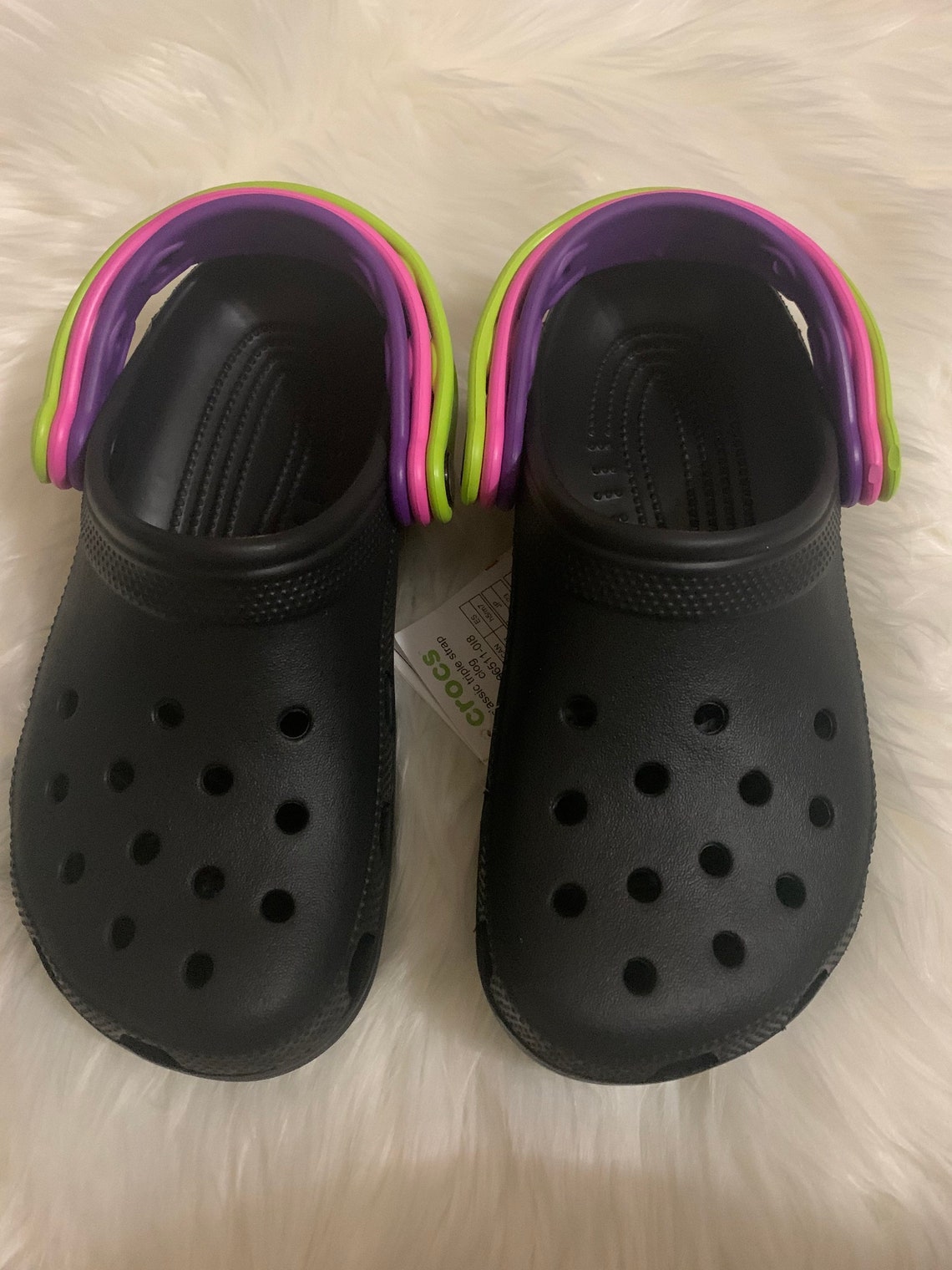 green and purple crocs