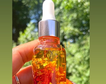 Huile de rose égyptienne : infusion d'or pur, de lotus bleu et de pétales de rose