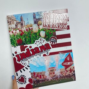 May include: A collage of images featuring Indiana University. The collage includes a photo of the iconic Sample Gates, a photo of a football game, and various stickers with the university's name and logo. The colors in the collage are red, white, and black.