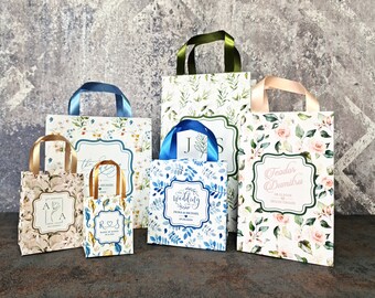 Wedding welcome bags with pattern and custom personalization. Thank you bags. Hotel bags. More designs and ribbon colors available.