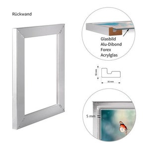 May include: A silver frame with a 1.75 inch wide border. The frame is made of aluminum and has a smooth, flat surface. The frame is designed to hold a picture or artwork. The text "R&uuml;ckwand" is visible in the top left corner of the image.