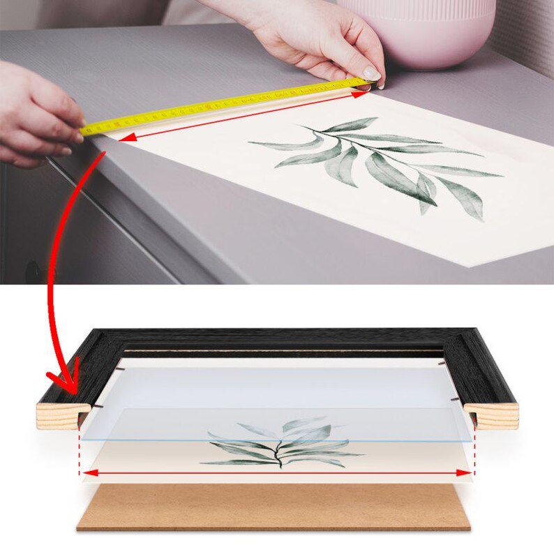 May include: A black frame with a clear glass front and a brown mat board backing. The frame is used to display a print of a watercolor painting of a green leaf.